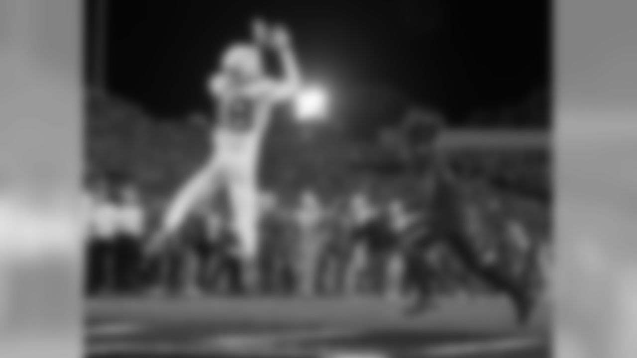 Texas' Davante Davis (18) intercepts a pass in the end zone during the first half of an NCAA college football game against Texas Tech, Saturday, Nov. 10, 2018, in Lubbock, Texas. (AP Photo/Brad Tollefson)
