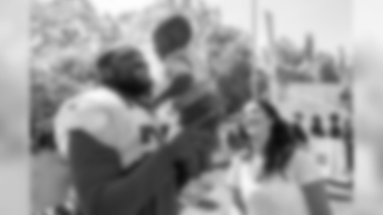 Detroit Lions running back LeGarrette Blount (29) spends time with his family after training camp practice on Thursday, Aug. 2, 2018 in Allen Park, Mich. (Detroit Lions via AP)