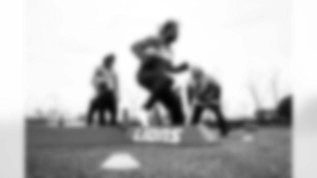 Detroit Lions running back Jermar Jefferson (28), Detroit Lions running back Godwin Igwebuike (35), Detroit Lions Assistant Head Coach/Running Backs Coach Duce Staley during a morning workout at the Lions training facility in Allen Park, MI on May 2, 2022. (Jeff Nguyen/Detroit Lions)