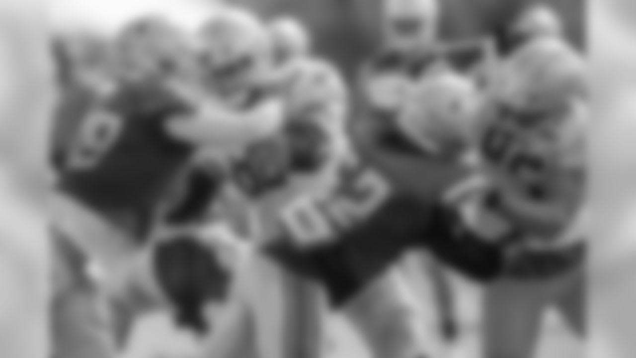 Detroit Lions tackle Taylor Decker (68) and tight end Luke Willson (82) block during training camp practice on Monday, July 30, 2018 in Allen Park, Mich. (Detroit Lions via AP)
