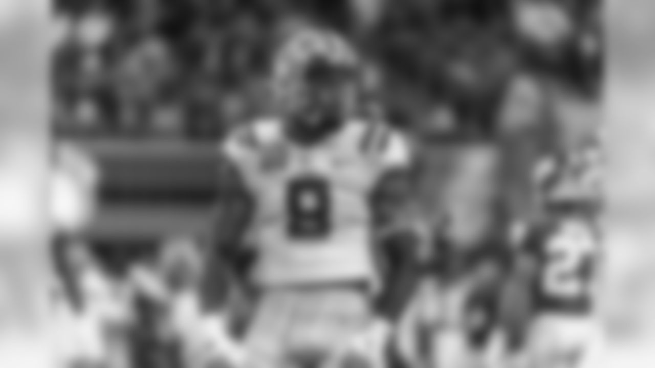 LSU linebacker Patrick Queen (8) celebrates during the Peach Bowl NCAA semifinal college football playoff game against Oklahoma, Saturday, Dec. 28, 2019, in Atlanta. (AP Photo/Danny Karnik)