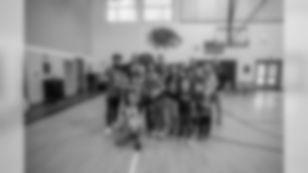 NFL Next 100 Super Bowl commercial contest winner Judah with his family, Detroit Lions cornerback Jamal Agnew (39), Roary and Detroit Lions kicker Matt Prater (5) at a Detroit Lions youth football assembly at Knapp Forest Elementary School, Monday, Jan. 27, 2020, in Grand Rapids, Mich.