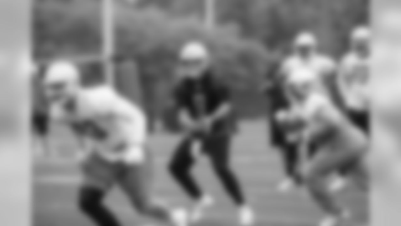 Detroit Lions running back C.J. Anderson (26) and quarterback Matthew Stafford (9) during Day 4 of OTAs on Wednesday, May 29, 2019 in Allen Park, Mich. (Detroit Lions via AP)