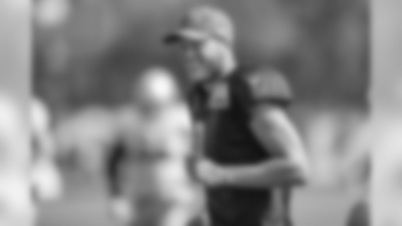 Detroit Lions quarterback Matthew Stafford (9) smiles during training camp practice on Saturday, Aug. 4, 2018 in Allen Park, Mich. (Detroit Lions via AP)