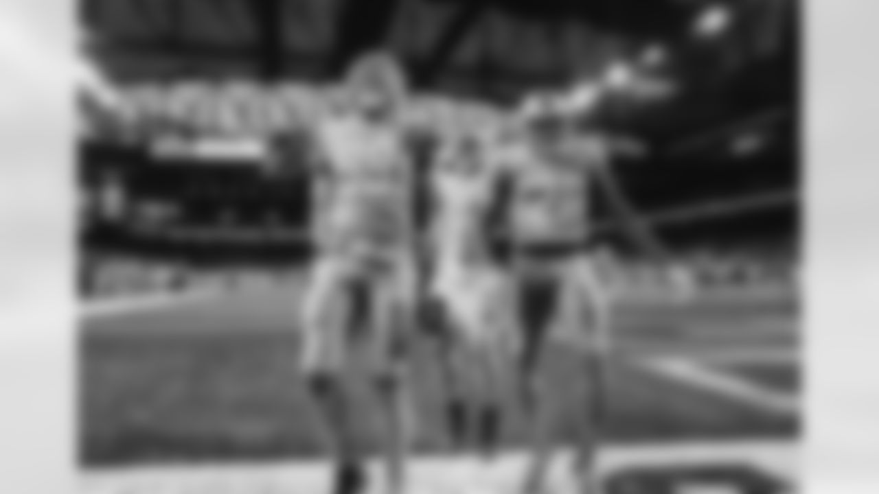 Detroit Lions outside linebacker Julian Okwara (99) and Detroit Lions safety Tracy Walker (21) celebrate after recovering a fumble during a NFL football game against the Minnesota Vikings on Sunday, December 5, 2021 in Detroit, MI. (Jeff Nguyen/Detroit Lions).