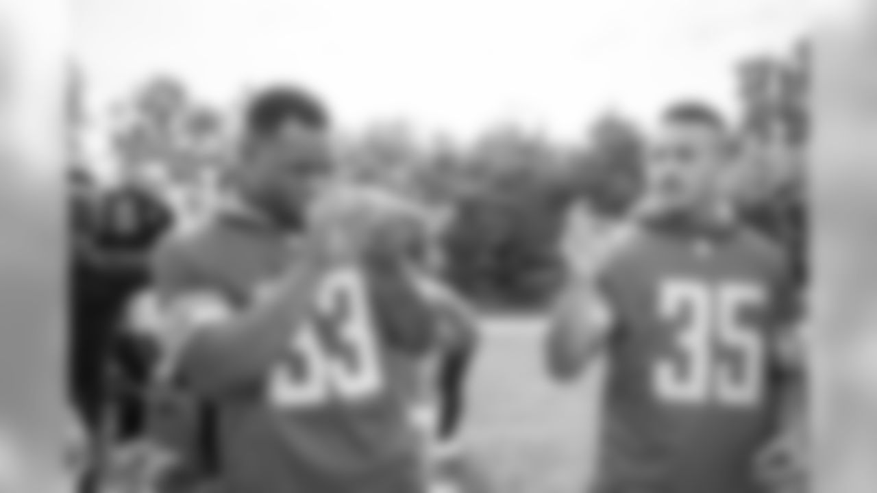 Detroit Lions defensive lineman Da'Shawn Hand (93) and Detroit Lions safety Miles Killebrew (35) help build rockets with students from Detroit Lions Academy as part of Season Launch Week presented by Rocket Mortgage Tuesday, Sept. 10, 2019 in Allen Park, Mich.