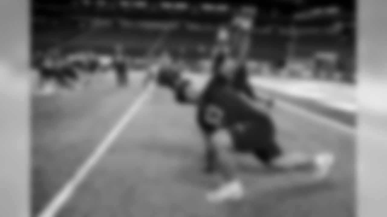 Iowa offensive lineman Tristan Wirfs stretches at the NFL football scouting combine in Indianapolis, Friday, Feb. 28, 2020. (AP Photo/Charlie Neibergall)