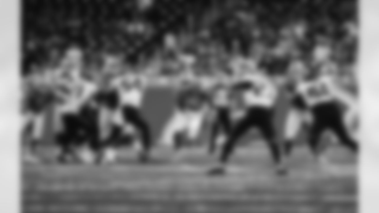 Detroit Lions running back Jamaal Williams (30), Detroit Lions center Frank Ragnow (77), and Detroit Lions guard Halapoulivaati Vaitai (72) during a NFL preseason football game against the Atlanta Falcons on Friday, August 12, 2022 in Detroit, MI. (Jeff Nguyen/Detroit Lions).