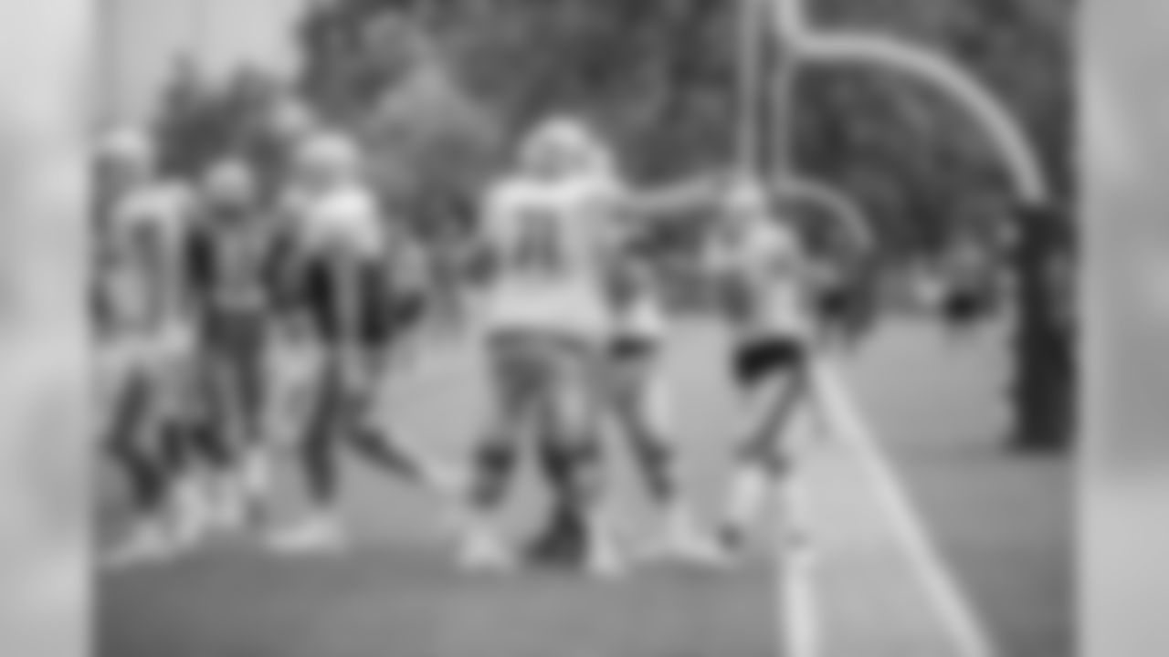 Detroit Lions tackle Rick Wagner (71) and Detroit Lions wide receiver Danny Amendola (80) celebrate a touchdown during Day 6 of Detroit Lions Training Camp presented by Rocket Mortgage on Wednesday, July 31, 2019 in Allen Park, Mich.