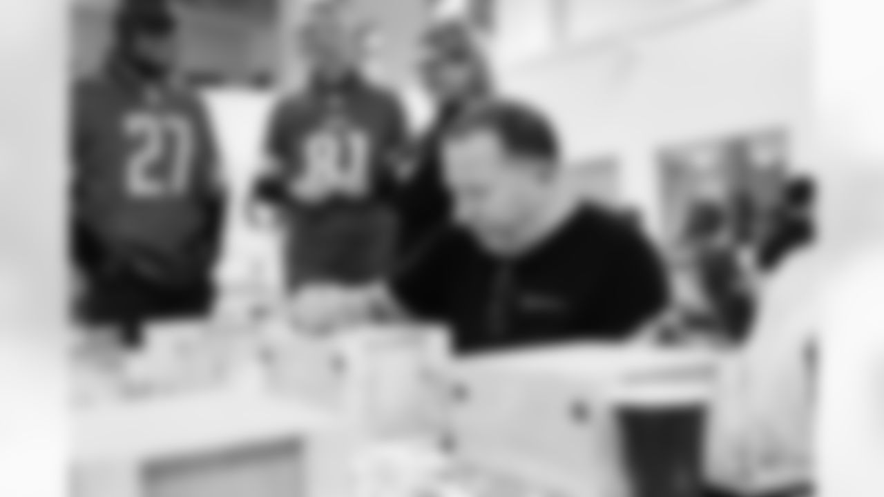 Volunteers from Humanetics joined the Lions and Stronger Warrior Foundation to prepare care packages and letters to be sent overseas to active service members as a part of the Salute to Service initiative on October 28, 2021. (Jeff Nguyen/Detroit Lions)