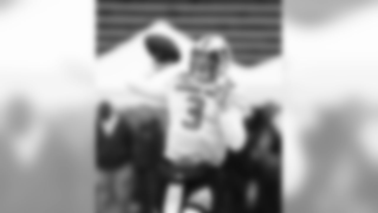 North quarterback Drew Lock of Missouri (3) throws a pass during practice for Saturday's Senior Bowl college football game, Tuesday, Jan. 22, 2019, in Mobile, Ala. (AP Photo/Butch Dill)