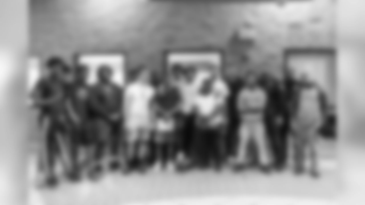 Charles Washington and Teez Tabor visit with participants for a conversation on social resilience at on Thursday, June 7, 2019 in Detroit.