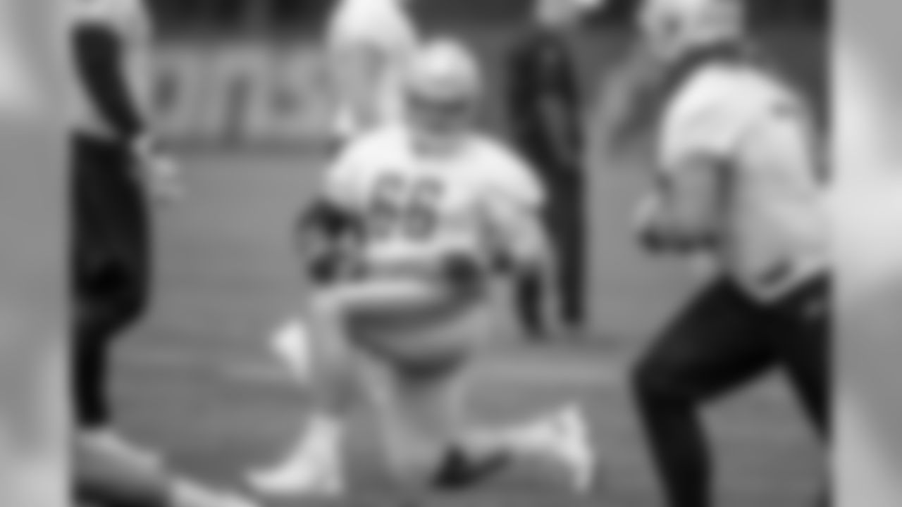 Detroit Lions guard Joe Dahl (66) stretches during Day 2 of OTAs on Tuesday, May 21, 2019 in Allen Park, Mich. (Detroit Lions via AP)