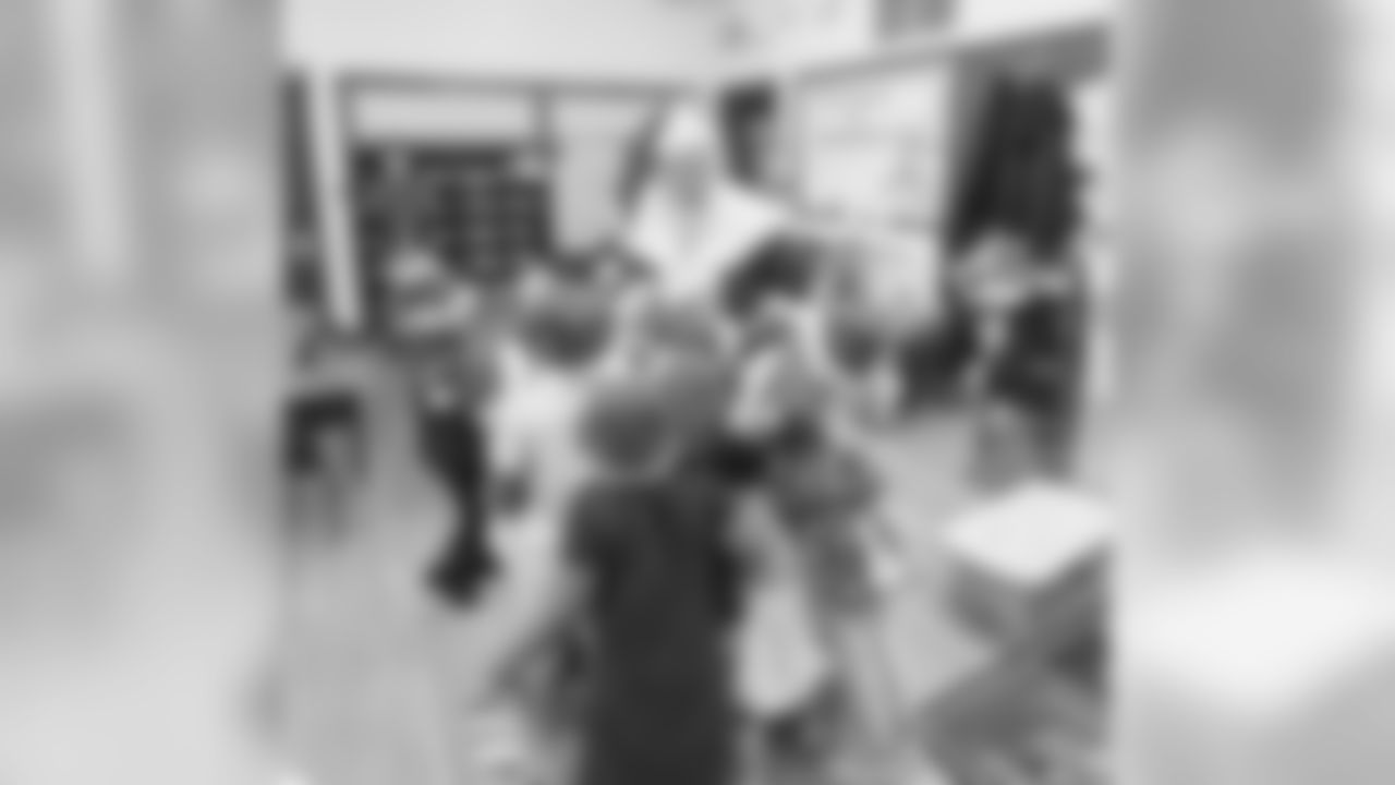 Santa Claus with students at Mary McLeod Bethune Elementary-Middle School Tuesday, Dec. 10, 2019 in Detroit.