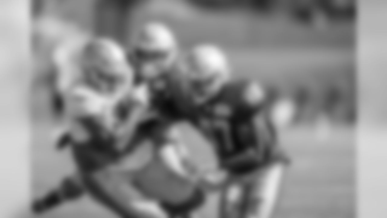 Detroit Lions wide receiver Travis Fulgham (84) makes a catch in tight coverage during Day five of Detroit Lions Training Camp presented by Rocket Mortgage on Tuesday, July 30, 2019 in Allen Park, Mich.