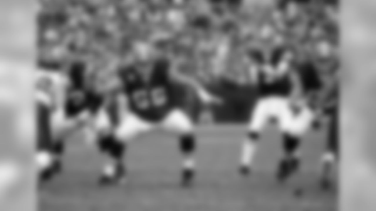 Center Hank Fraley #66 of the Cleveland Browns pass blocks during the game against the Houston Texans on November 25, 2007 at Cleveland Browns Stadium in Cleveland, Ohio. The Browns defeated the Texans 27-17. (AP Photo/Paul Spinelli)