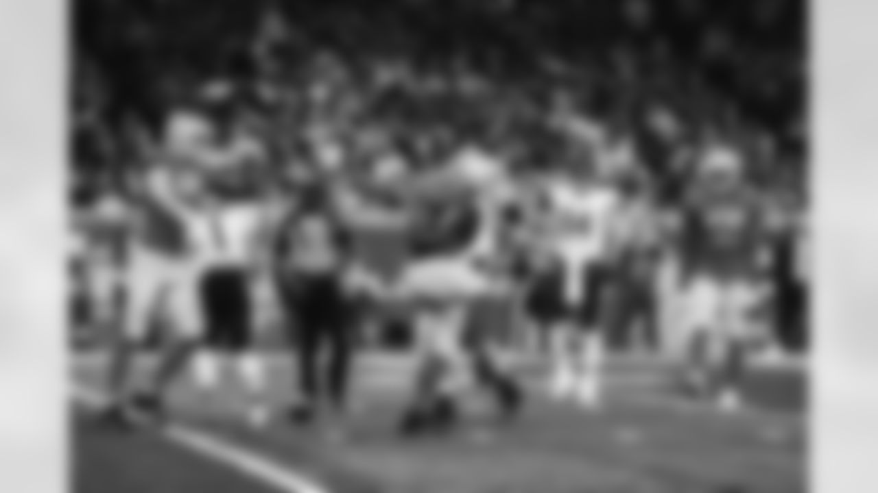 Detroit Lions defensive lineman Aidan Hutchinson (97), Detroit Lions linebacker James Houston (59), and Detroit Lions defensive lineman Josh Paschal (93) celebrate after a sack during a NFL football game against the Chicago Bears on Sunday, January 1, 2023 in Detroit, MI. (Jeff Nguyen/Detroit Lions).during a NFL football game against the Chicago Bears on Sunday, January 1, 2023 in Detroit, MI. (Jeff Nguyen/Detroit Lions).