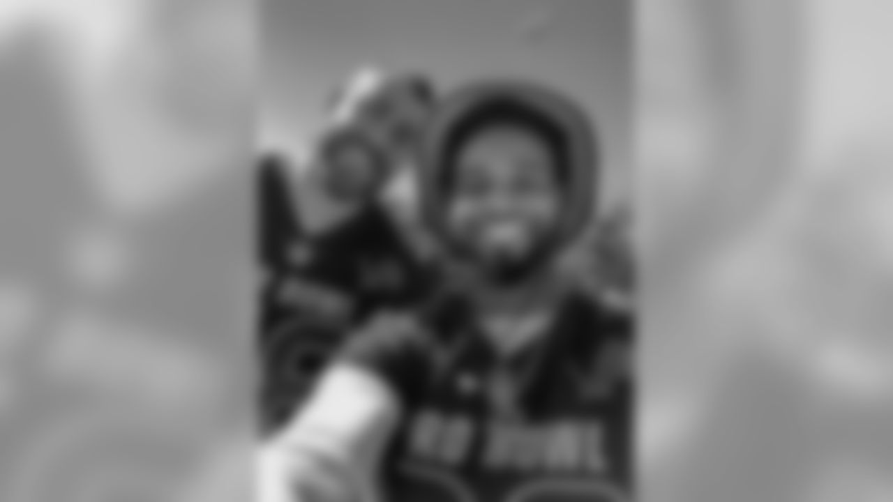 Detroit Lions cornerback Darius Slay (23) and Detroit Lions long snapper Don Muhlbach (48) take a selfie at the NFC Pro Bowl team photo on Friday, Jan. 25, 2019 in Orlando, Fla. (Detroit Lions via AP)