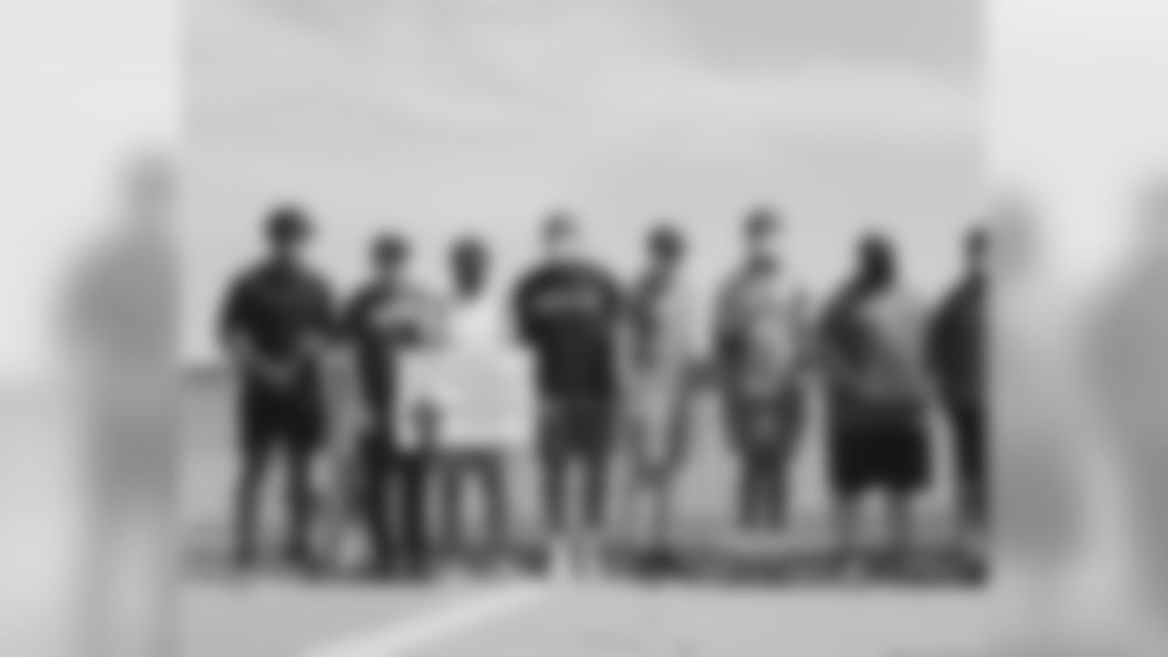 Christian Jones, Kyle Caskey, Jamal Agnew, Romeo Okwara, Dylan Thompson, Julian Okwara and Matt Patricia with demonstrators at the Belle Isle Peace March Friday, June 5, 2020 in Detroit.