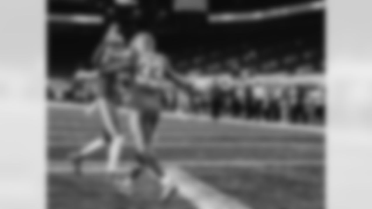 Detroit Lions running back Kerryon Johnson (33) and Detroit Lions wide receiver Marvin Jones Jr. (11) celebrate a touchdown during an NFL football game against the Green Bay Packers on Sunday, Dec. 13, 2020 in Detroit. (Detroit Lions via AP).