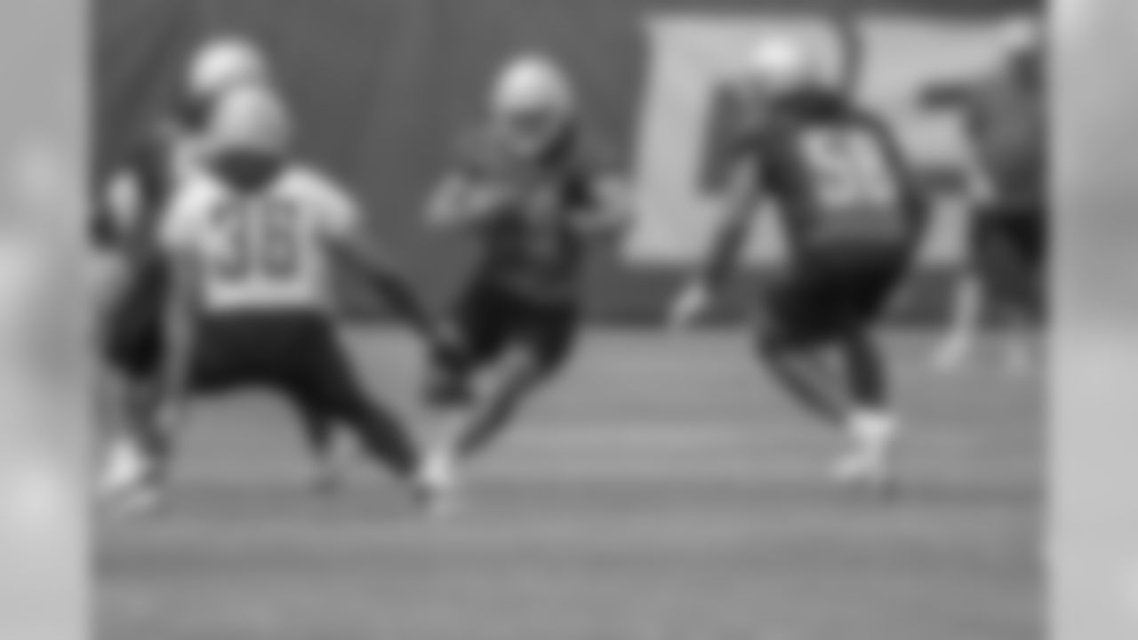 Detroit Lions cornerback Jamal Agnew (39) returns a punt on special teams during an OTA practice at the Detroit Lions training facility on Tuesday, May 22, 2018 in Allen Park, Mich. (Detroit Lions via AP)