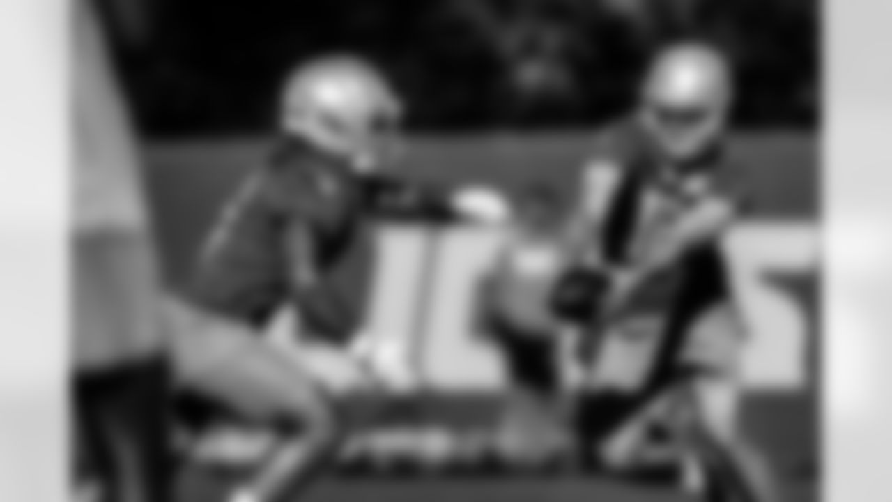 Detroit Lions quarterback Jared Goff (16) and Detroit Lions running back Craig Reynolds (46) during Lions Training Camp at the Training Facility in Allen Park, MI on July 29, 2022. (Josh Mandujano/Detroit Lions)