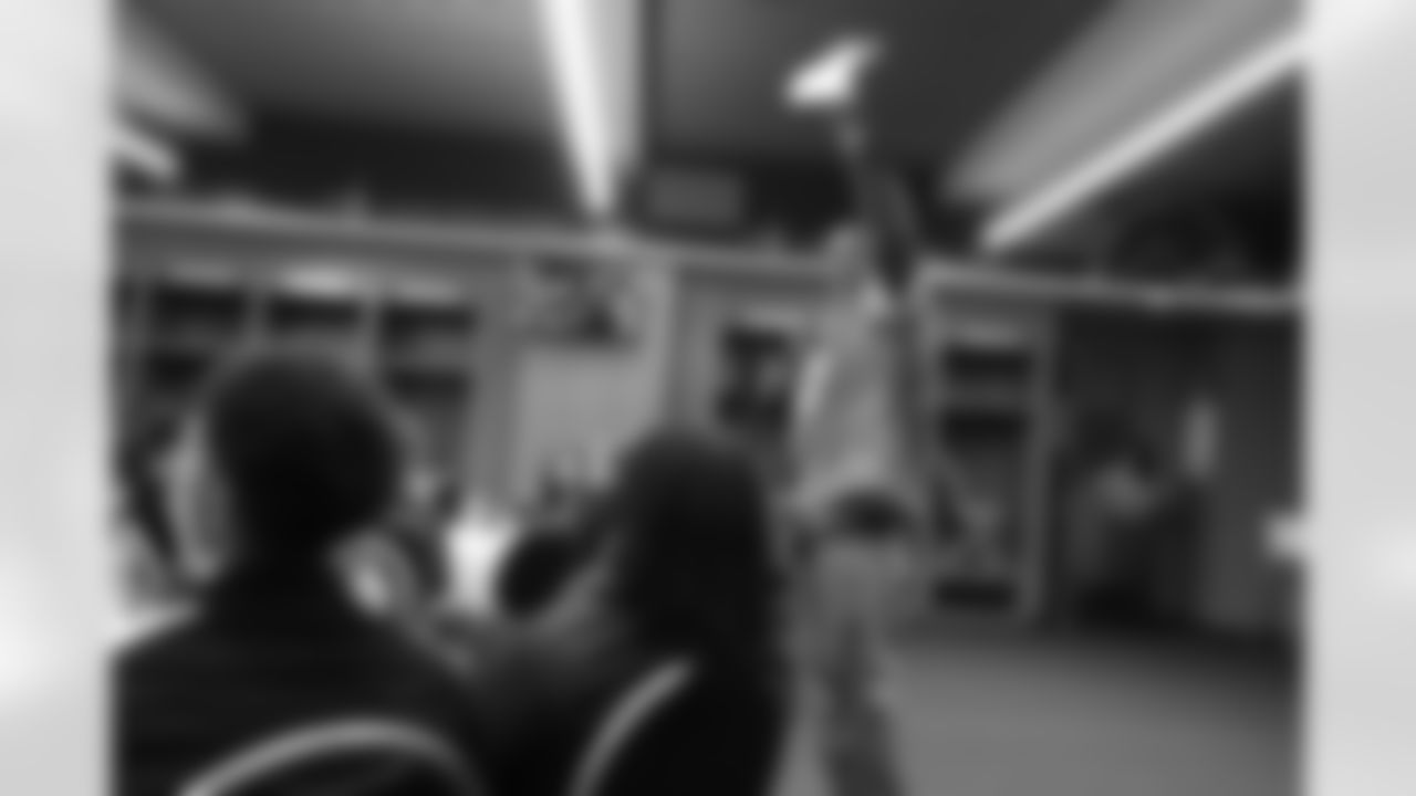 Former Detroit Lions tackle Lomas Brown (75) at a pizza party with students from Renaissance High School in the Ford Field locker room on Wednesday, May 8, 2019 in Detroit.