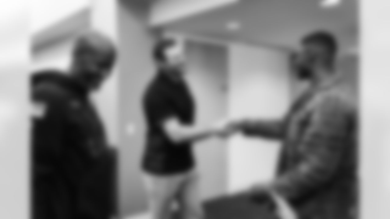 Detroit Lions wide receiver DJ Chark meeting with Detroit Lions Head Coach Dan Campbell and Detroit Lions General Manager Brad Holmes at the Lions facility in Allen Park, MI on March 17, 2022. (Jeff Nguyen/Detroit Lions)
