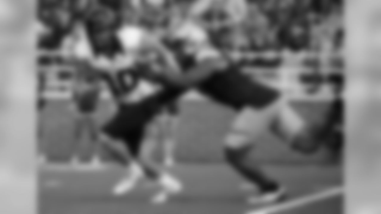 View photos of NFL prospect Harold Landry.