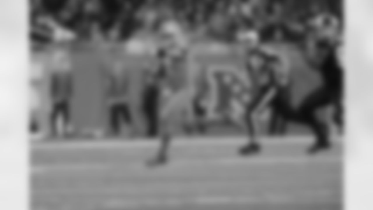 Detroit Lions quarterback Matthew Stafford (9) points while scrambling during a NFL football game against the Carolina Panthers on Sunday, Nov. 18, 2018 in Detroit. (Detroit Lions via AP).