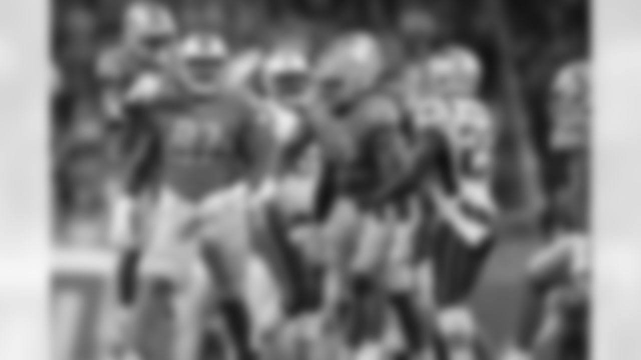 Detroit Lions defensive tackle Ricky Jean Francois (97) and the defense celebrate a stop during a NFL football game against the New England Patriots on Sunday, Sept. 23, 2018 in Detroit. (Detroit Lions via AP).