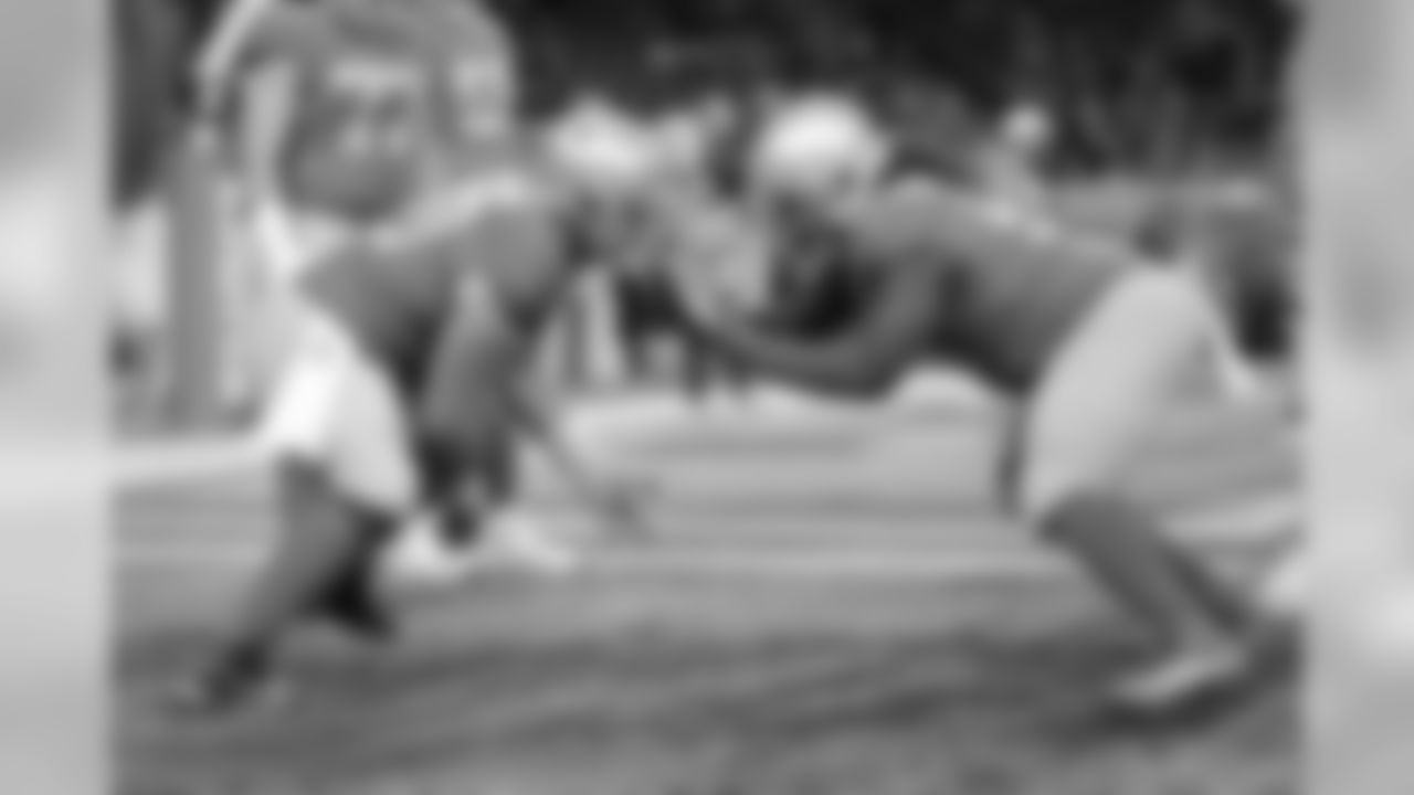 Detroit Lions center/guard Graham Glasgow (60) and Detroit Lions defensive tackle Damon Harrison (98) warm up before a NFL football game against the Chicago Bears on Thursday, Nov. 22, 2018 in Detroit. (Detroit Lions via AP).
