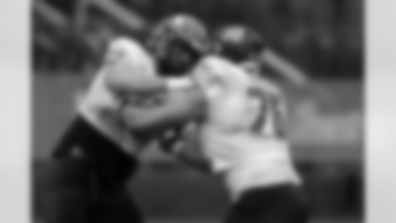 National Team offensive lineman Matt Waletzko of North Dakota and offensive lineman Bernhard Raimann of Central Michigan run through drills during practice for the Reese's Senior Bowl Tuesday, Feb. 2, 2022, in Mobile, Ala. (AP Photo/Butch Dill)