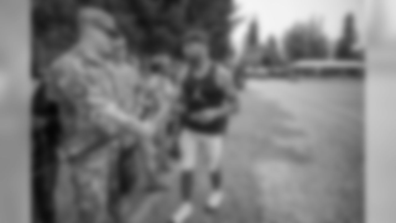Detroit Lions wide receiver Golden Tate visits with military members following training camp practice on Wednesday, Aug. 8, 2018 in Napa, Calif. (Detroit Lions via AP)