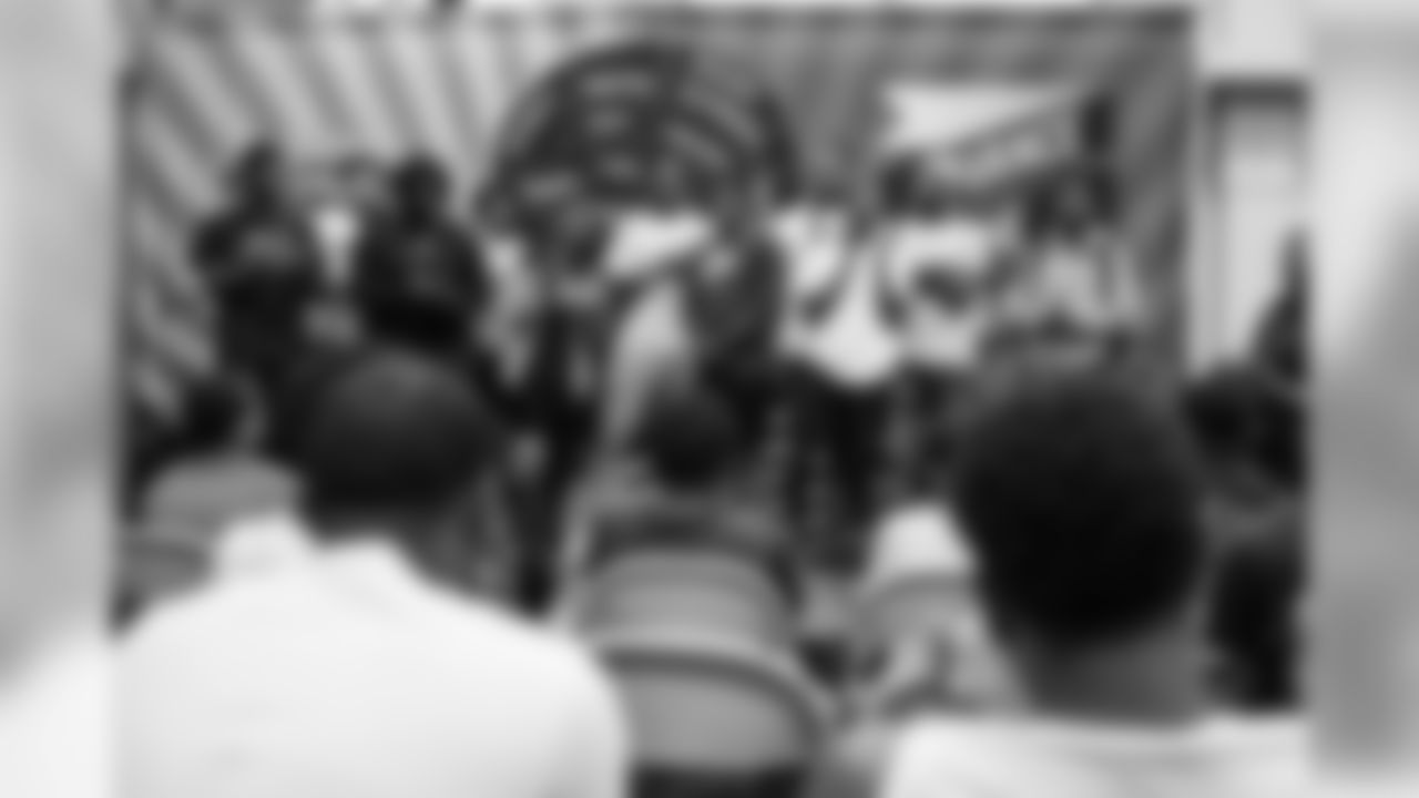 Charles Washington, Teez Tabor, Devon Kennard, Da'Shawn Hand and Tavon Wilson join participants for a conversation on social resilience at on Thursday, June 7, 2019 in Detroit.