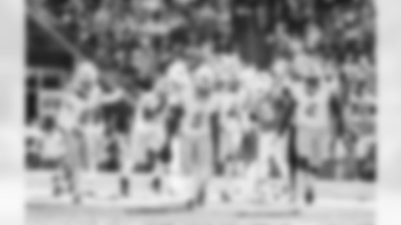 Detroit Lions safety DeShon Elliott (5), Detroit Lions defensive lineman Austin Bryant (2), and Detroit Lions cornerback AJ Parker (41) celebrate after an interception during a NFL football game against the New England Patriots on Sunday, October 9, 2022 in Foxborough, MA. (Jeff Nguyen/Detroit Lions).