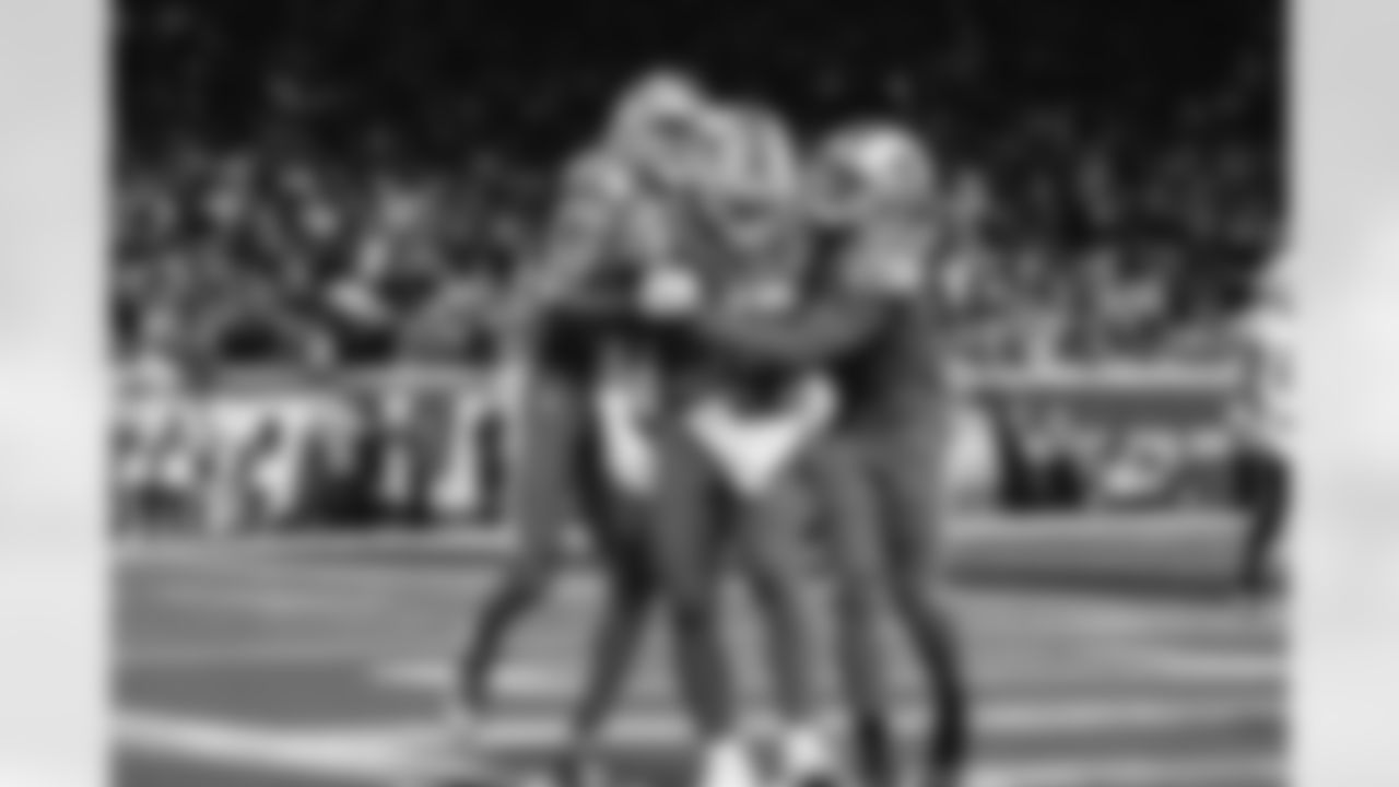 Detroit Lions wide receiver Marvin Jones Jr. (0), Detroit Lions running back Craig Reynolds (13), and Detroit Lions wide receiver Kalif Raymond (11) celebrate after a touchdown during a NFL game against the Carolina Panthers on Sunday, Oct. 8, 2023 in Detroit, MI. (Jeff Nguyen/Detroit Lions)