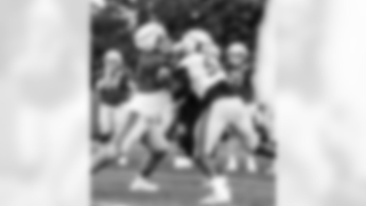 Detroit Lions tackle Taylor Decker (68), Detroit Lions defensive lineman Charles Harris (53) during training camp at the Lions training facility in Allen Park, MI on July 29, 2023. (Jeff Nguyen/Detroit Lions)