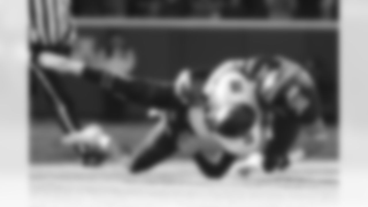 Northwestern quarterback Clayton Thorson is sacked by Minnesota's Blake Cashman during the first half of an NCAA college football game Saturday, Nov. 17, 2018, in Minneapolis. (AP Photo/Stacy Bengs)