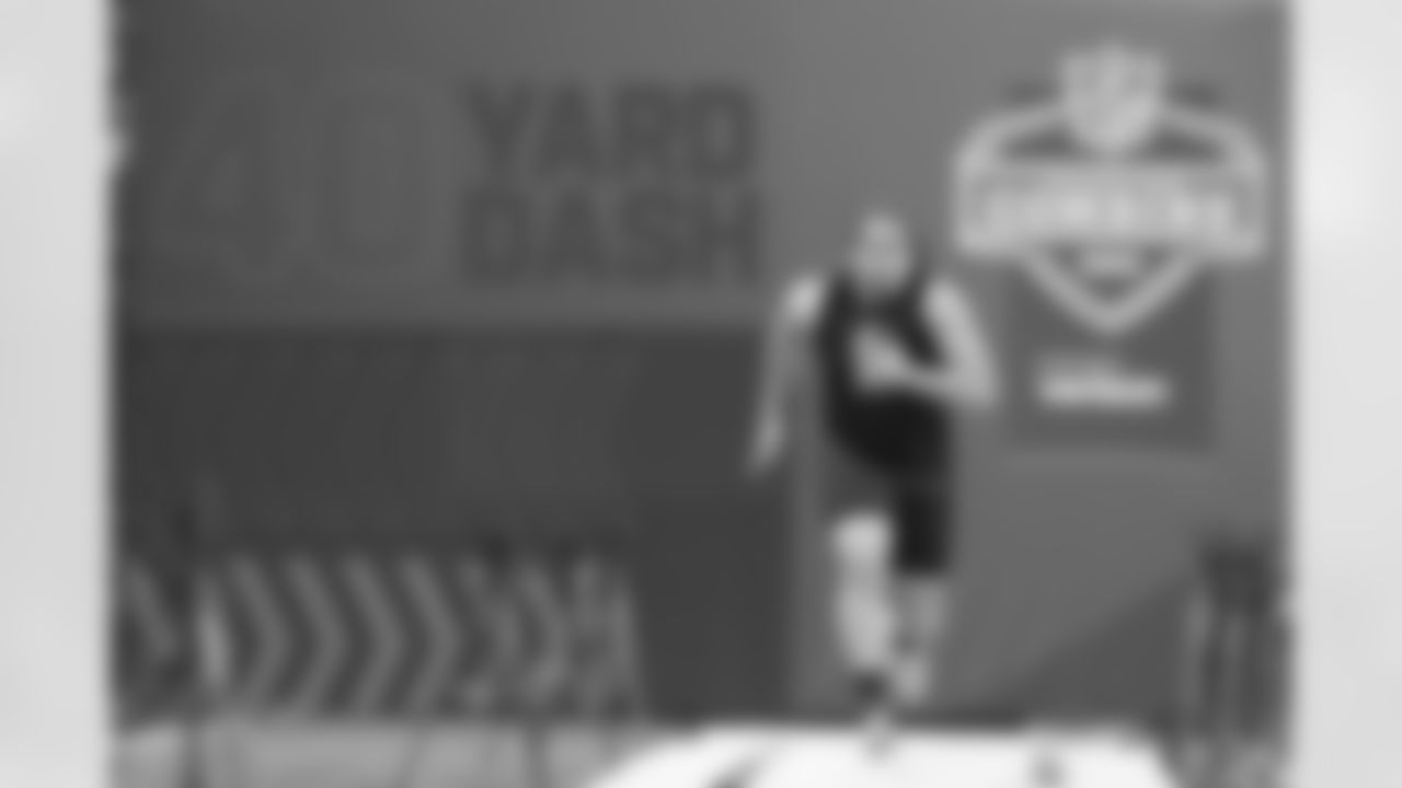LSU offensive lineman Austin Deculus runs the 40-yard dash during the NFL football scouting combine, Friday, March 4, 2022, in Indianapolis. (AP Photo/Darron Cummings)