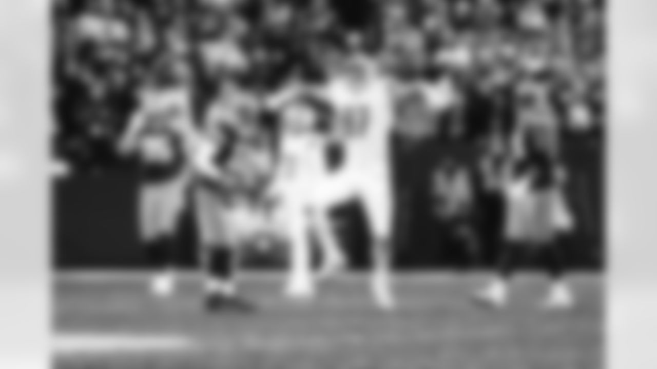 Green Bay Packers quarterback Aaron Rodgers (12) sacked by Detroit Lions defensive lineman Aidan Hutchinson (97) during a NFL football game against the Green Bay Packers on Sunday, January 8, 2023 in Green Bay, WI. (Jeff Nguyen/Detroit Lions).