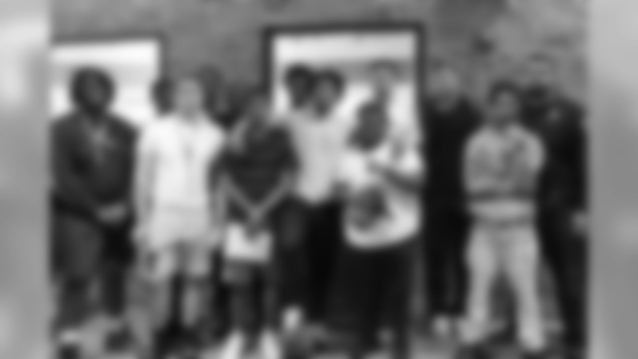 Charles Washington and Teez Tabor visit with participants for a conversation on social resilience at on Thursday, June 7, 2019 in Detroit.