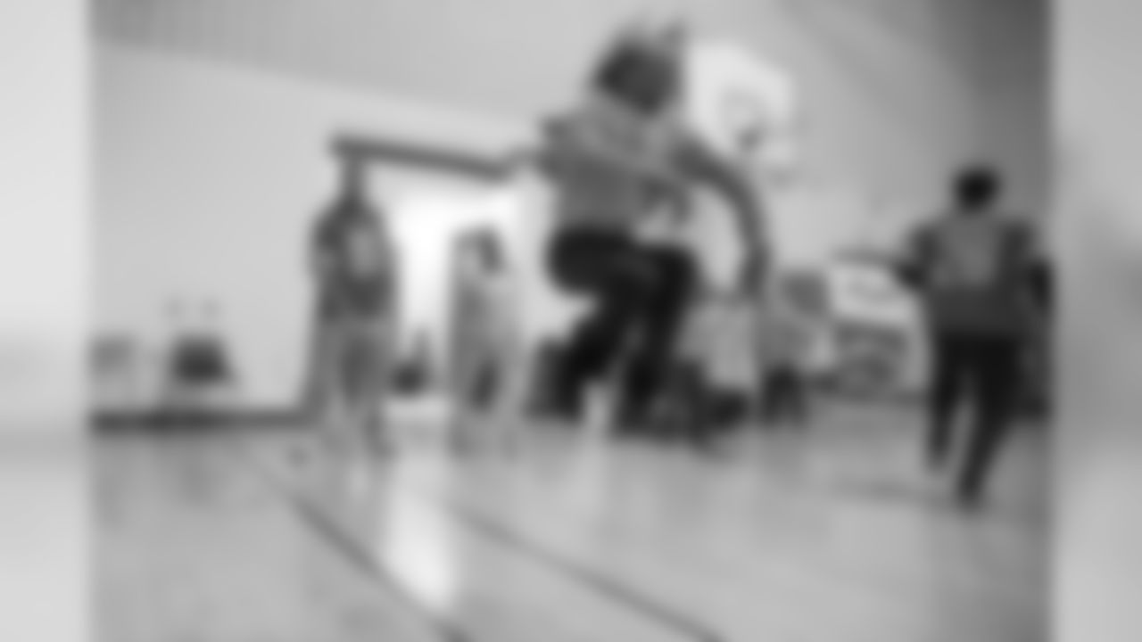 Detroit Lions defensive end Romeo Okwara (95) jumps rope with students at a real players don't bully assembly with Playworks at Hutchinson Elementary School on Tuesday, Oct. 22, 2018 in Detroit.