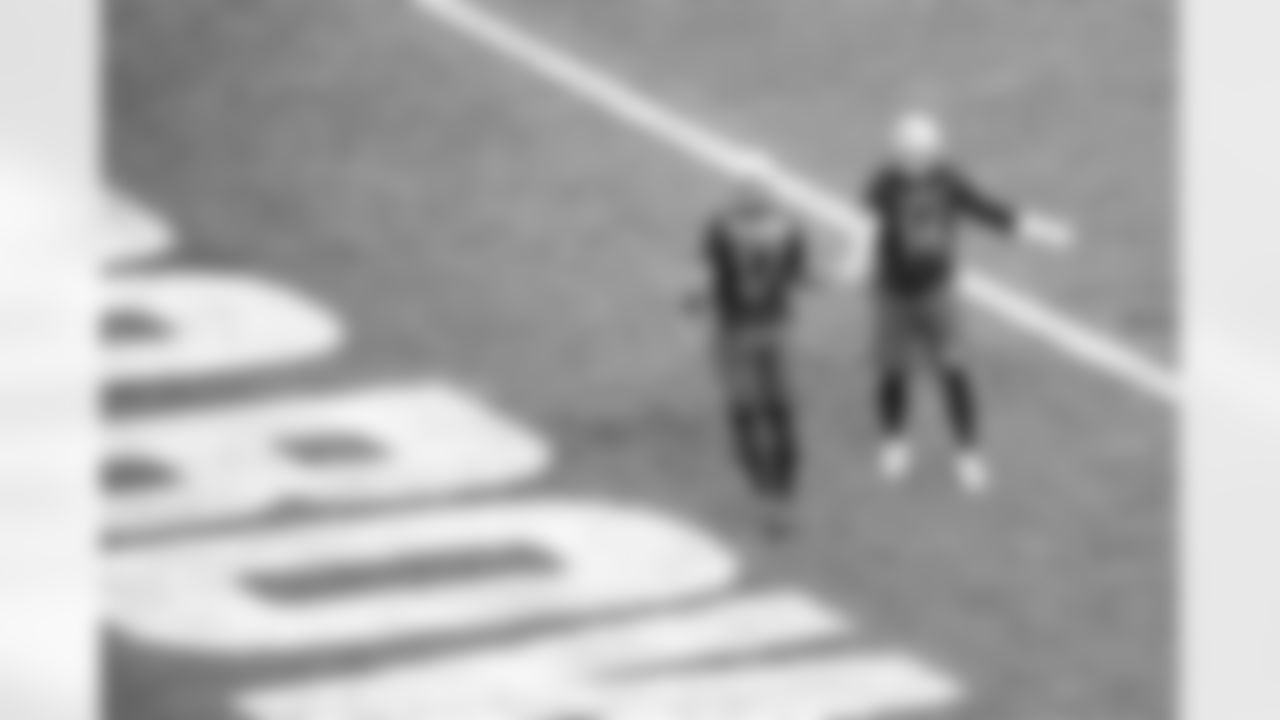 Detroit Lions wide receiver Amon-Ra St. Brown (14) celebrates his touchdown catch with Washington Commanders wide receiver Terry McLaurin (17) during the 2023 Pro Bowl Games in Las Vegas, NV on February 5, 2023. (Stuart Zaas/Detroit Lions)