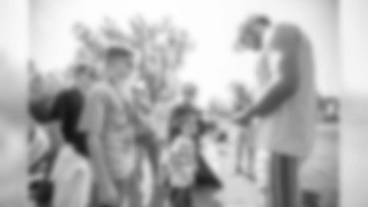 Quarterback Matthew Stafford signs autographs for military members attending Day 3 of 2019 Detroit Lions Training Camp presented by Rocket Mortgage on Saturday, July 27, 2019 in Allen Park, Mich. (Detroit Lions via AP)