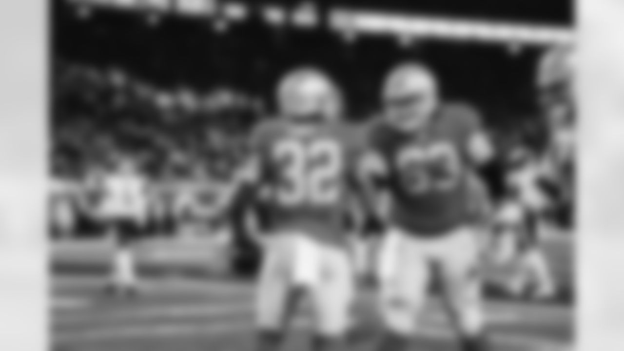 Detroit Lions running back D'Andre Swift (32) and Detroit Lions center/guard Evan Brown (63) celebrate after a touchdown during a NFL football game against the Chicago Bears on Sunday, January 1, 2023 in Detroit, MI. (Jeff Nguyen/Detroit Lions).