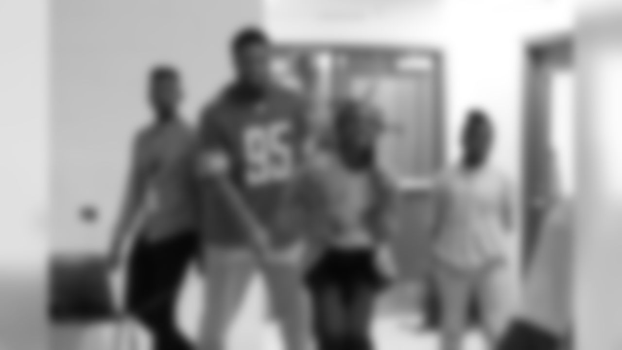 Detroit Lions defensive end Romeo Okwara (95) jump ropes with students at a real players don't bully assembly with Playworks at Hutchinson Elementary School on Tuesday, Oct. 22, 2018 in Detroit.