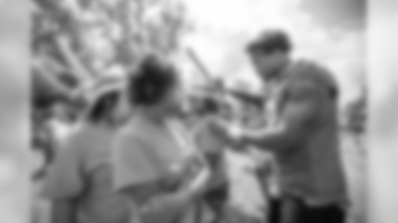 Detroit Lions linebacker Christian Jones (52) visits with guests from Downtown Boxing Gym on Day 6 of Detroit Lions Training Camp presented by Rocket Mortgage on Wednesday, July 31, 2019 in Allen Park, Mich.