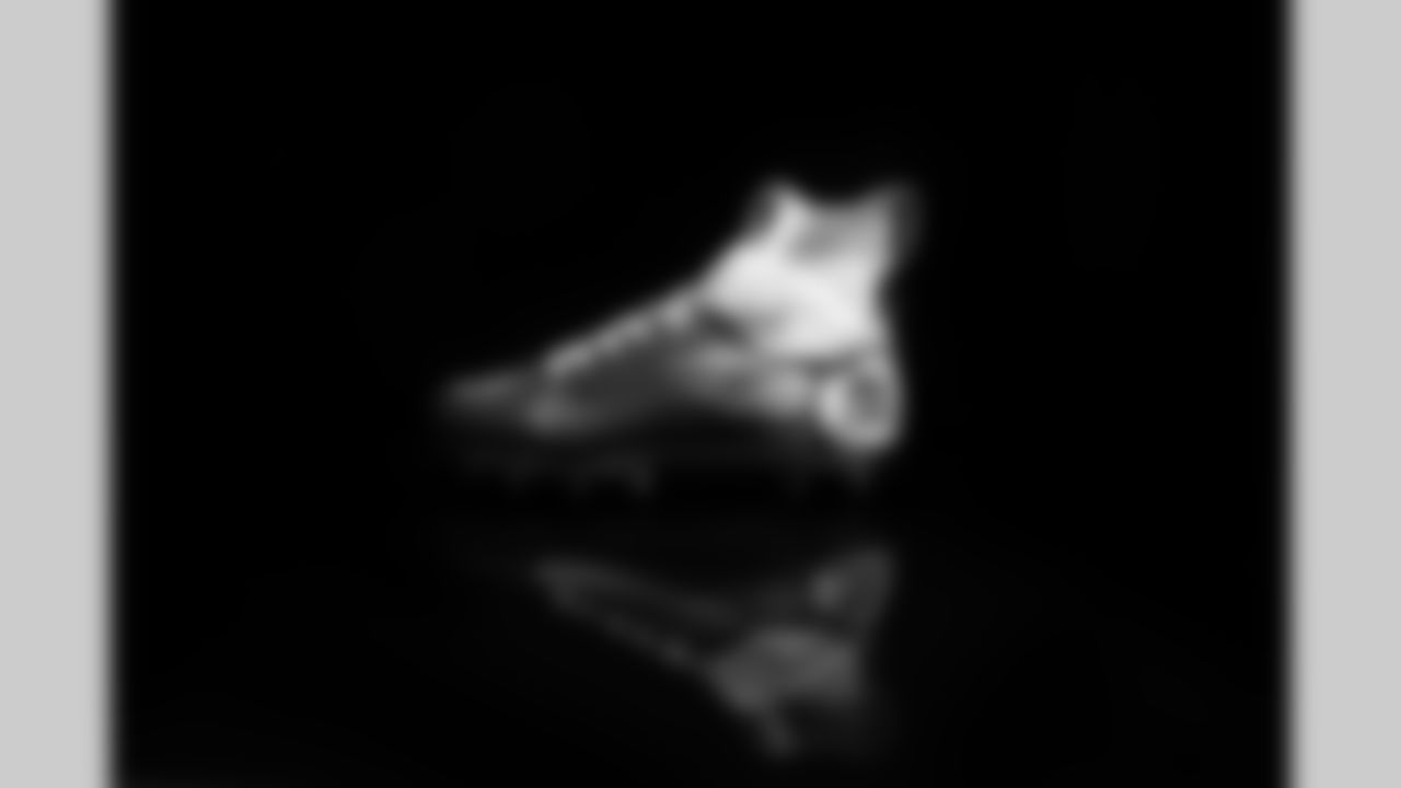 Cleats belonging to Detroit Lions outside linebacker Trey Flowers (90) for the My Cause My Cleats initiative, shot in Allen Park MI on November 19, 2021. (Jeff Nguyen/Detroit Lions)