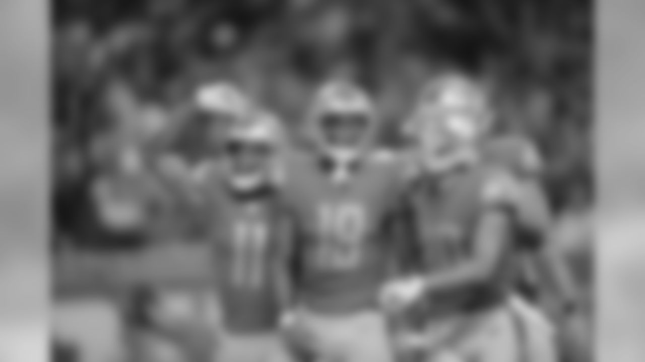 Detroit Lions wide receiver Marvin Jones Jr. (11), Detroit Lions wide receiver Kenny Golladay (19) and Detroit Lions wide receiver Danny Amendola (80) celebrate a touchdown catch during a NFL football game against the Los Angeles Chargers Sunday, Sept. 15, 2019 in Detroit. (Detroit Lions via AP).